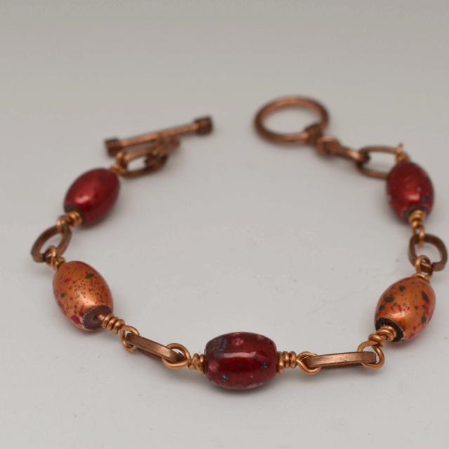 Red and Orange Speckled Glass Bead Bracelet